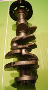 Cast iron crankshaft and pulley.