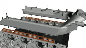 When reinstalling the intake  manifold, the locating tabs on the  intake manifold gasket should face up and toward the center of the engine.
