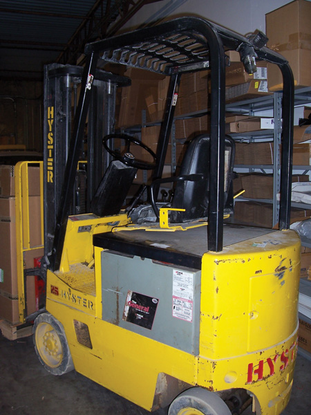 Most of the forklifts I see in shops are in the 4,000 pound capacity. They can generally lift items up to 20 feet high. Some have hard (no air) solid tires and some come with pneumatic tires for use inside as well as use outside. Forklifts can be very dangerous and only a trained, certified and highly qualified operator should be allowed to drive one. 