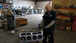 Engine builder Brad Millers prepping the engine block for assembly.