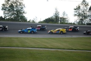 Cars circle the track in the Modified Racing Series.