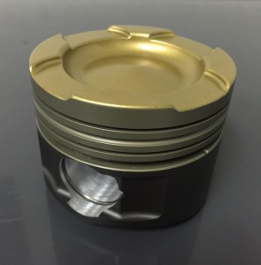 When ordering a set of custom pistons, one of the things you’ll have to consider is the type of coating you want. There is top thermal coating, anodizing, wrist pin bore anti-wear coating, and anti-scuff skirt coating. Photo courtesy of Diamond Racing Products.