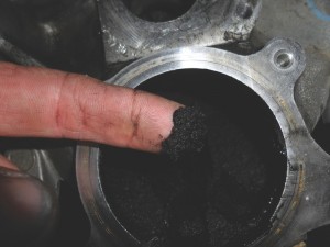 When incorporating an EGR valve on a diesel engine, the object is to bring exhaust gas back into the intake  manifold to be re-burned. When the exhaust gas enters the intake manifold, you have displaced oxygen that was being brought in from the outside air for combustion. Combustion  temperature will drop because there was not a complete burn. This in turn makes soot, which clogs everything up.