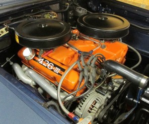 This street engine sports a combination of parts gathered by DePillo using a 1970 440 block as the starting point. Included is a steel crank, 12-1 Diamond Pistons, factory Max Wedge Heads, factory Max Wedge Cross-Ram intake with two Holley carbs. It burns 112 octane race fuel and puts out 500 horsepower.
