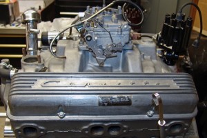 This stock-appearing ‘63 Vette 327 engine has received a ton of  upgrades to greatly increase its  horsepower. Bob Kammer  explained that it has forged pistons, moly Rings, a healthy aftermarket cam with solid lifters, a three-angle valve job, and  electronic ignition.