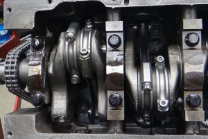 Other work on Kammer’s 426 Hemi included stronger springs, retainers and keepers(left photo). The use of I-Beam rods and a magnafluxed and turned crank bring more power to the table (right photo)