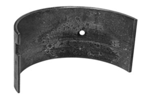 Foreign particles in the bearing lining may be the result of improper cleaning or a failure to replace the filter and may include road dirt and sand. MAHLE Clevite photo.
