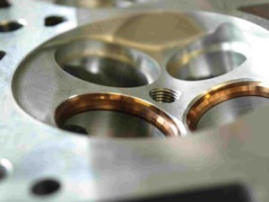 Many engine builders and valve seat suppliers say a few thousandths of interference may not be adequate when replacing valve seats in high mileage heads.