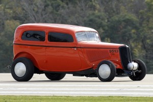 The old ‘33 Ford Sedan cuts a striking figure at speed. Its best effort has been 147 miles per hour.