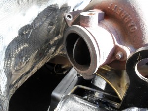A flap was placed in the exhaust side of the turbo for warm up purposes. When the engine is cold, the PCM will command an actuator to close the flap which will increase back pressure on the engine restricting the exhaust to aid in warm up.