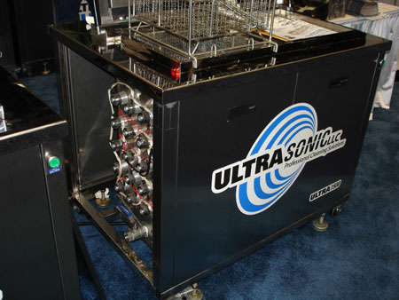 ultrasonic systems come in many sizes, though many look like the size of a food fryer with a heated tank on top and the valves and nozzles below.