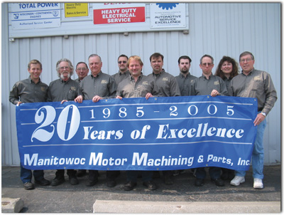 the 2005 machine shop of the year. scott wichlacz (far left) and the entire hardworking crew at manitowoc motor machining and parts, manitowoc, wi.