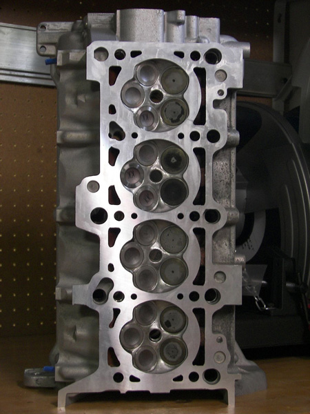 ohc heads are usually multi-valve, 4-cylinder and v6 aluminum heads. above is a vw 20-valve cylinder head that is commonly rebuilt.