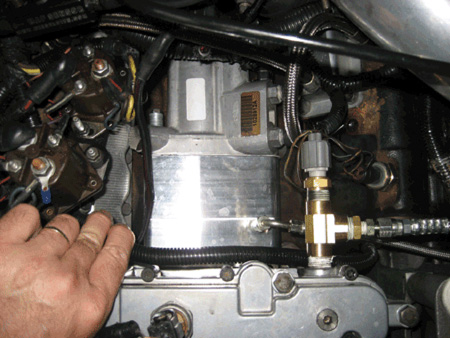 this is a photo of the aftermarket performance hpop mounted atop of the engine in place of the traditional injection pump.