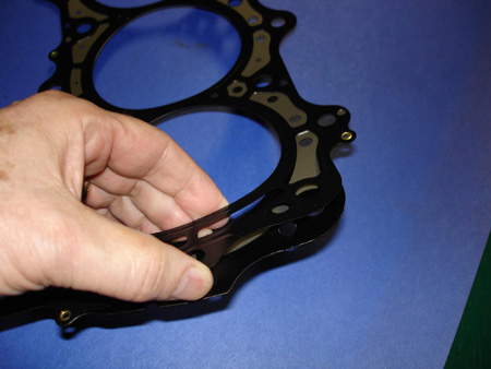 multi layer steel (mls) head gaskets have three to five layers of steel and a very thin rubber coating on the outside to improve cold sealing. mls gaskets are very durable, but if they do have to be replaced the rubber tends to stick to the surface and can be difficult to remove. 