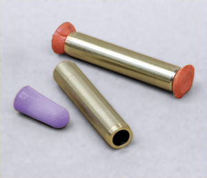 Ear plugs are used for protecting valve guides while cleaning.