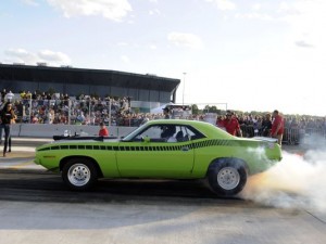 A 1970 Plymouth AAR ‘Cuda performs a burnout Aug. 12, 2015, during the RoadKill Nights Powered by Dodge at the Pontiac Silverdome in Pontiac. (Photo: Steve Perez / The Detroit News)