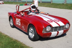 Vintage racing accounts for a lot of engine builds both for repair and for performance upgrades. This Triumph TR6 races at Road America in Wisconsin.