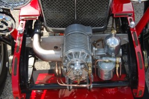 The supercharger is stock equipment on this prewar MG, but fitting superchargers to later model cars is a great profit center for many engine shops.