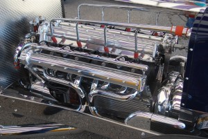 Vintage speed equipment is common to see on the racing cars at the Miller’s in Milwaukee meet. This beautiful overhead cam eight has finned side covers and lots of high-polished parts.