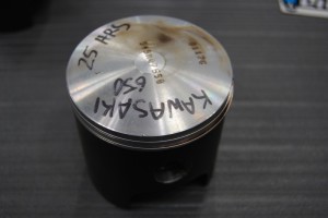 When pistons are sent to the Clarkston, MI, facility where the coatings are manufactured and applied, they should be marked up like this with a dry marker to let Line2Line know the clearance measurements you found.