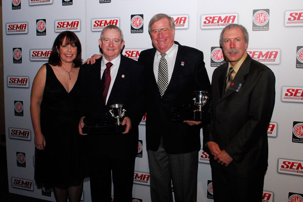 The PWA Person of the Year Bob Cook (second from left) is flanked by PWA President Anne Graves. Vic Edelbrock (second from right), whose company was named the PWA Manufacturer of the Year, stands with PWA President-Elect Donnie Eatherly. 