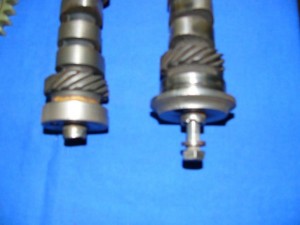 A closer view of the early 58 to 62, spring held,  flanged cam on the right. The new plate retained the type on the left.