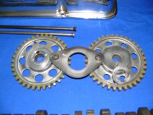 Good view of the early flat rear, upper timing gear on the right, with the needed remote .222 thick steel spacer. The later upper timing on left has the spacer molded on the back. Do not mix these up. Never use the remote spacer with the late spacer step molded gear. The steel retainer was used on both types from 1963 on.